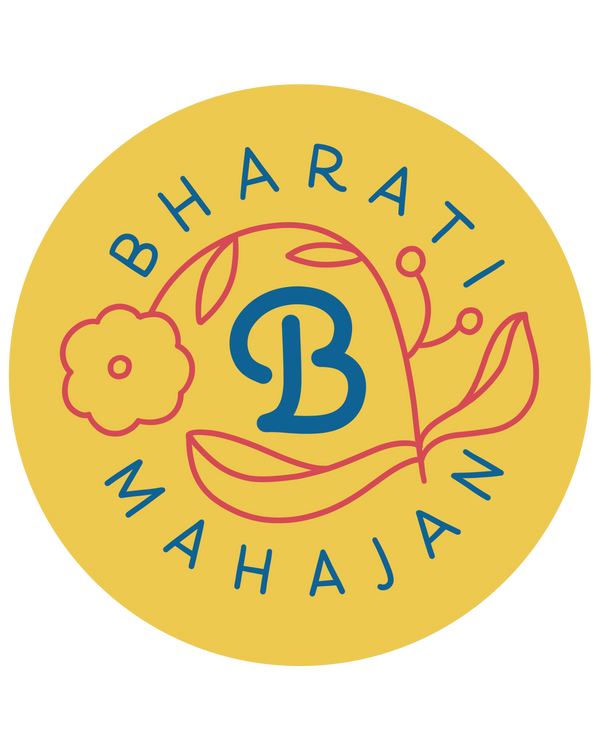 Bharati Mahajan logo, a round yellow badge with a blue letter B, a coral flower and vine, and the name curved around the edge